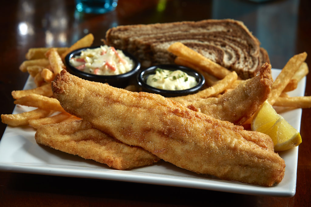 Hand breaded walleye fillets fried to golden brown and served with coleslaw, marble rye bread, tartar sauce and choice of side. $17.99
