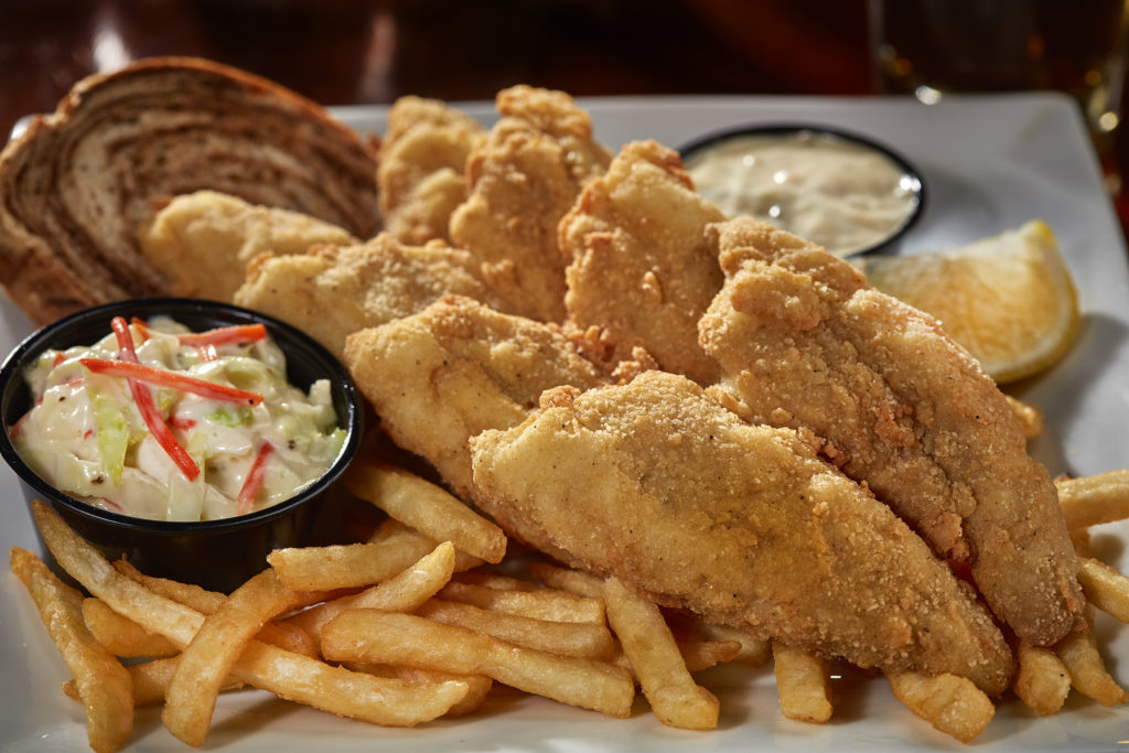 Anduzzi's hand breaded fresh lake perch fried golden brown and served with coleslaw, marble rye bread, tartar sauce and choice of side. 2 filets - $24.99, 3 filets $29.99