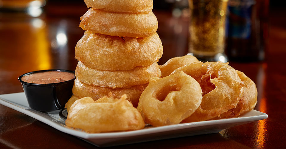 Stack of onion rings on a plate