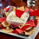 Spinach and artichoke dip with chips