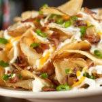 Loaded pub chips with chives and cheese