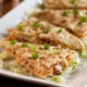 Chicken bacon quesadilla with chives and lettuce